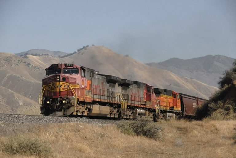 A diesel class I line haul locomotive emits black smoke